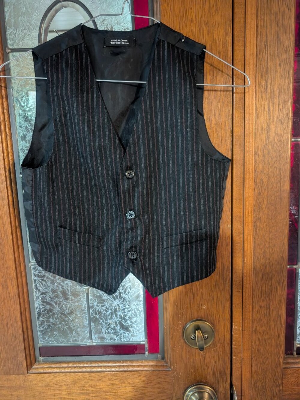 Boys black pinstripe vest, size 7